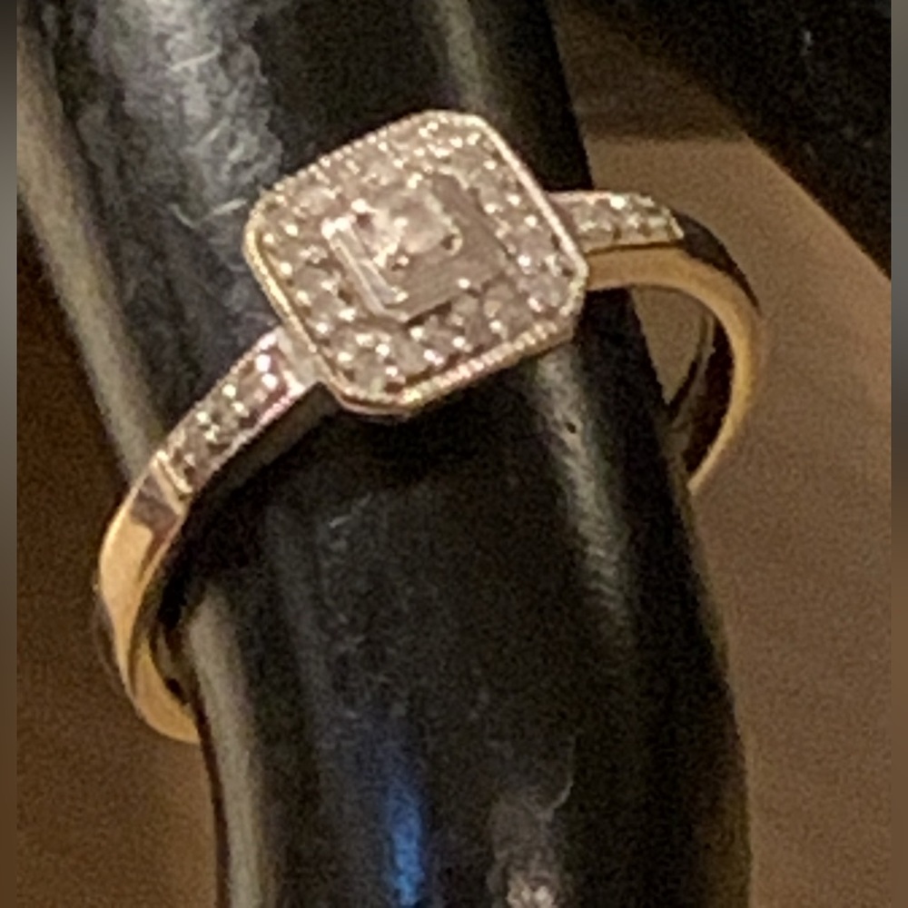10k gold diamonds ring.